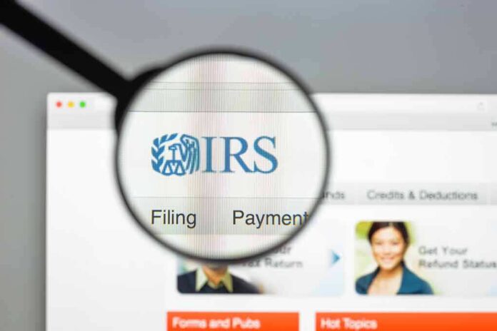 696480235 featured image Magnifying glass over IRS website page