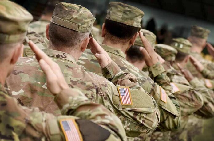 1548712049 featured image Soldiers in camouflage uniforms saluting in formation outdoors