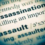 Dictionary page with word assassination highlighted