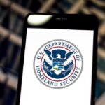 U S Department of Homeland Security logo on smartphone