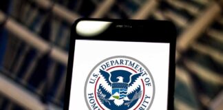 U S Department of Homeland Security logo on smartphone