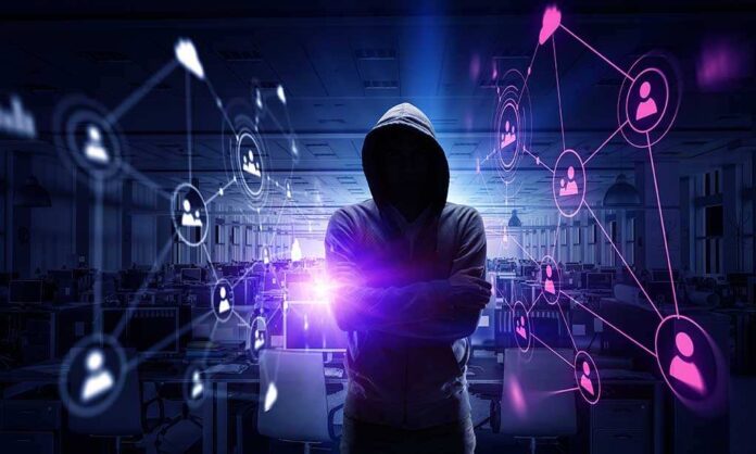 635529080 featured image Hacker in hooded sweatshirt with digital connections overlay