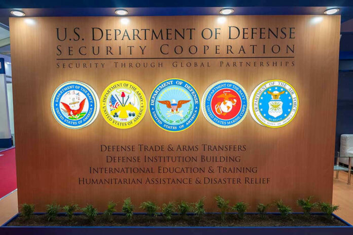 1283770690 US Department of Defense Security Cooperation display with logos