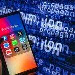 Smartphone showing social media apps with text background