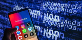 Smartphone showing social media apps with text background