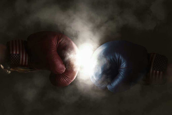 Red and blue boxing gloves clashing with smoke