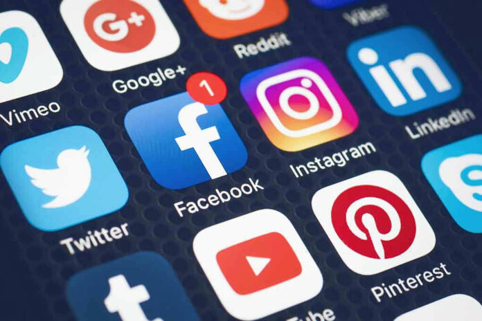 Social media app icons on a smartphone screen