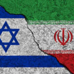 Israeli and Iranian flags divided by a cracked line