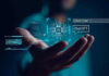 Hand holding digital AI and ChatGPT graphics