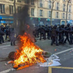 Armed Guards Flood D.C.—Nobody Ready for This Protesters and police clash; fire in the street.
