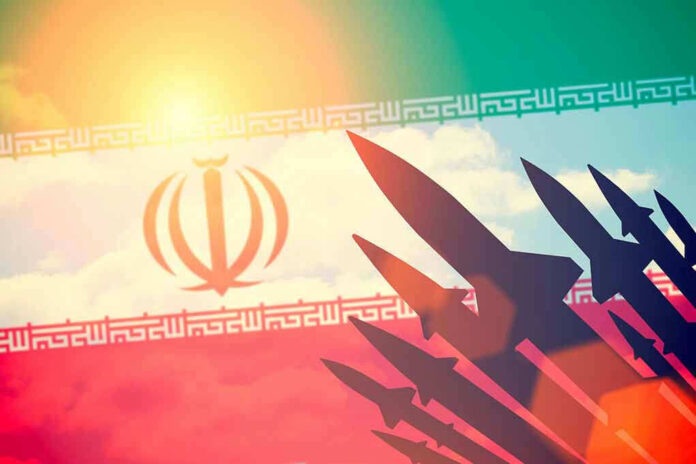 Silhouettes of missiles over Iran's flag graphic.
