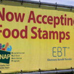 SNAP Budget DEPLETED—41 Million Face Empty Plates Yellow sign now accepting food stamps EBT SNAP