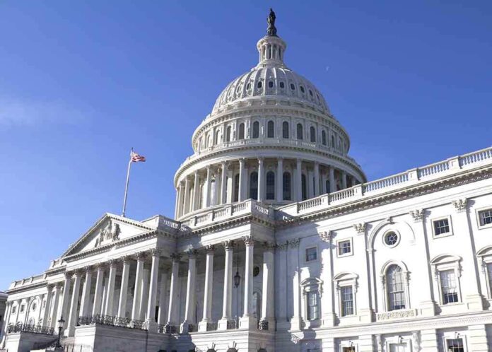 The U.S. Capitol building with a clear blue sky in the background
