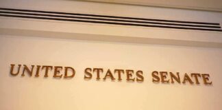 Sign displaying United States Senate in a government building