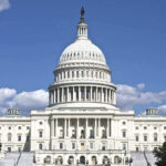 Clintons IGNORE Subpoenas – Contempt of Congress! U.S. Capitol building against blue sky.