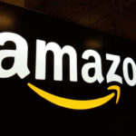 Amazon Fumbles Mass Layoff Plan – Epic Email Mistake! Amazon logo with yellow curved arrow underneath.