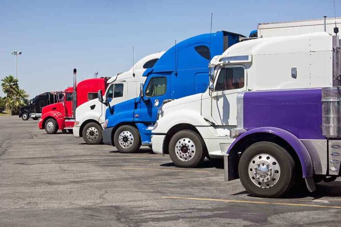 A lineup of colorful trucks parked in a lot