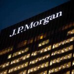 Trump SUING JP Morgan Chase – Explosive Allegations! Illuminated J.P. Morgan building at night with visible office windows
