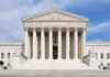 Trump Floats INSANE Nominee for Supreme Court Front view of the Supreme Court building with large columns and steps under a blue sky