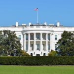 The White House with the American flag flying in front