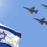 Iran’s Bold Move: U.S. Ships Targeted! Israeli flag with three fighter jets flying overhead.