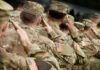 National Guardsman SHOOTS Colleague After He Found THIS! Soldiers in camouflage uniforms saluting in formation outdoors