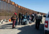 ‘Send Them Back’ Chants Erupt After Strictest-Ever Migration Law PASSED! Border patrol agents interact with a group of people.