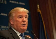 Pastor For Trump Scandal Implodes Overnight! A public figure speaking at a podium during a press conference
