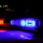 SICKO Illegal Alien Raped Body of a Dead Man for 30 Minutes! Close-up of police lights flashing in blue and red at night