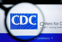CDC Warns Pet Owners – Flesh-Eating Fly ATTACKING Pets! CDC logo magnified on a screen.