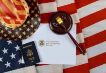 Trump Activates Secret Terror Court U.S. passport, gavel, and USCIS document on American flag
