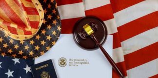 U.S. passport, gavel, and USCIS document on American flag