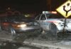 State Trooper SLAMMED By Drunk Driver! A damaged car and a police vehicle involved in a nighttime accident
