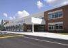 Counselor Turned Predator – School Stayed Quiet Modern school building with large windows and a clear sky