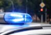 Police car blue siren light flashing