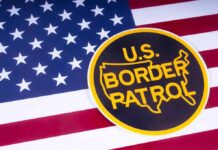 ICE Agents ARREST Johns Hopkins Professor While Boarding Flight U.S. Border Patrol emblem on American flag