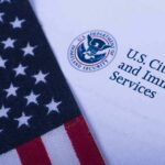 American flag beside U.S. immigration document