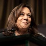 woman speaking at a podium