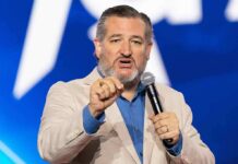Ted Cruz Teases 2028 Run After CLASH With Vance man speaking on stage with a microphone