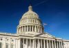 United States Capitol dome against clear blue sky