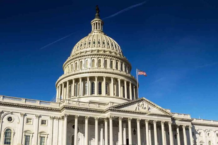 United States Capitol dome against clear blue sky