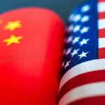 Chinese Nationals BUSTED in Bizarre Passport Scheme at U.S Airport Chinese and American flags side by side