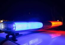 Army Vet Guns Down Masked Intruder – He Picked The Wrong House Police car light bar flashing blue and red at night