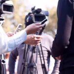 Journalist’s Racist Comment Erupts — Top Dem Rep Furious press interview with microphones and cameras outdoors