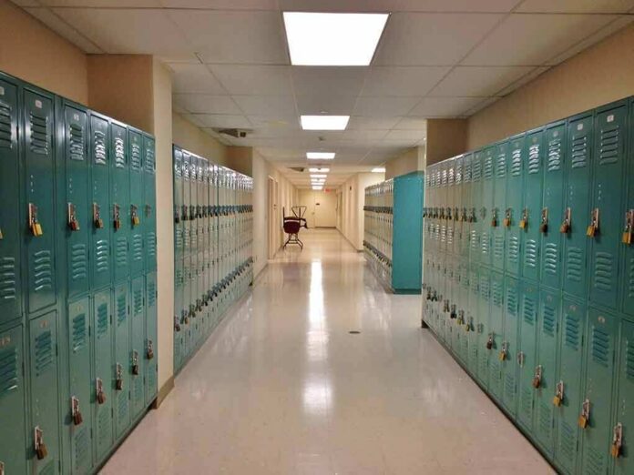 shutterstock_121588291 School hallway with rows of teal lockers