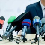 Fauci Backs Out of Testimony – Immediately Hit With Subpoena! microphones clustered on a table at a press conference