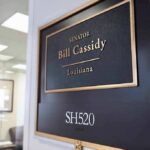 Police Called Over Missing Senator Question Office door plaque with senator name and room number