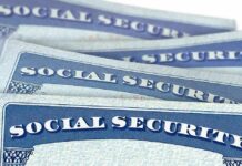 Social Security cards stacked in a close-up view