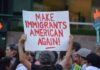 Troubling Anti-Ice Note Written at ICE Shooting Site Teddy Williams at a protest holding a sign reading 'Make Immigrants American Again'