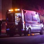 Hit-And-Run HOSPITALIZES Longest-Serving Congresswoman Ambulance at night with paramedics attending a patient